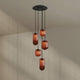 s.luce Velo Galerielampe 5-flammig Ø 60cm Baldachin Ø 18/20/25cm mit edlen Glaspendeln in Rot.