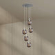 s.luce Velo 5-flammige Galerieleuchte Ø 60cm Baldachin Ø 20cm mit fünf Glaspendeln