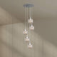 s.luce Velo 5-flammige Galerieleuchte Ø 60cm Baldachin Ø 20cm mit modernen Glaspendeln.
