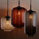 s.luce Velo 8-flammige Galerieleuchte Ø 80cm Baldachin Ø 18cm mit stilvollen Pendelleuchten aus Glas.