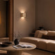 s.luce Travea LED Wandleuchte aus Travertin-Stein