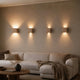 s.luce Travea LED Wandleuchte aus Travertin-Stein