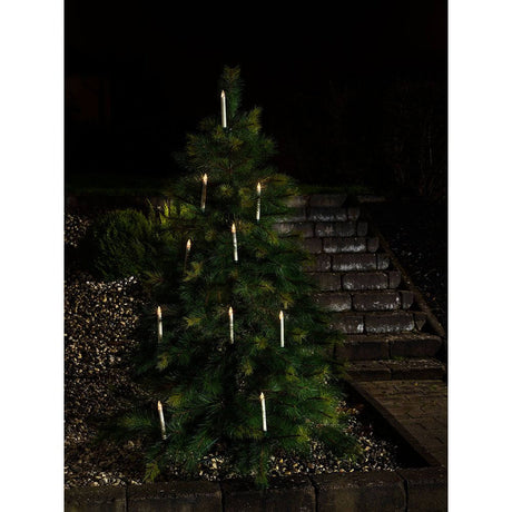 LED Tree lighting 10 candles remote control warm white battery-powered IP44 on the Christmas tree in the dark.