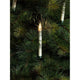 LED Baumbeleuchtung 10 Kerzen Fernbedienung Warmweiße batteriebetrieben IP44 an einem Tannenbaum.