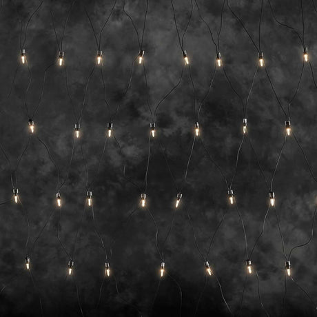 LED Light net 160 warm white diodes IP44 on a dark background with glowing diodes.